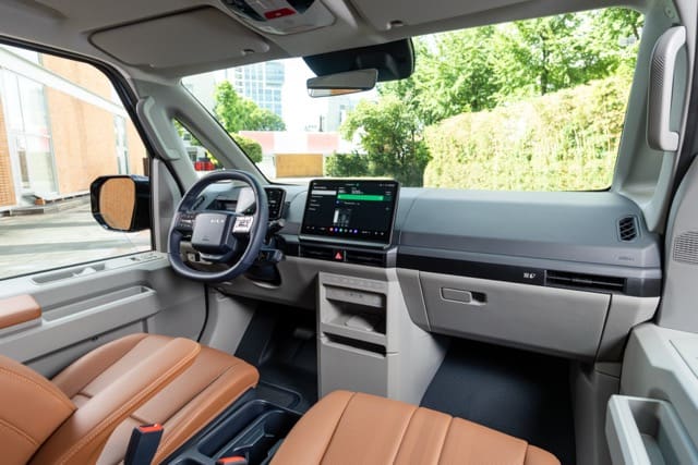 (Image 4) PV5-Passenger-Frost Blue-Front Medium