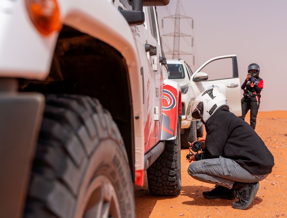 Changing tyre in desert